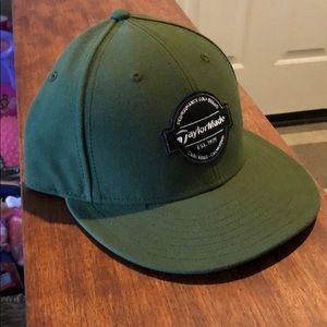 New Era. TaylorMade baseball hat.
